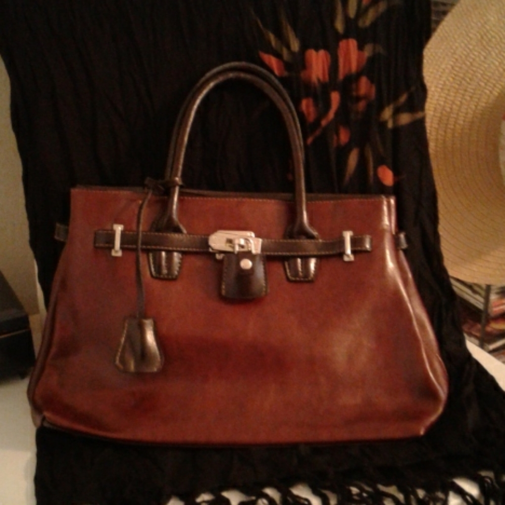 Rina Rich hand bag.